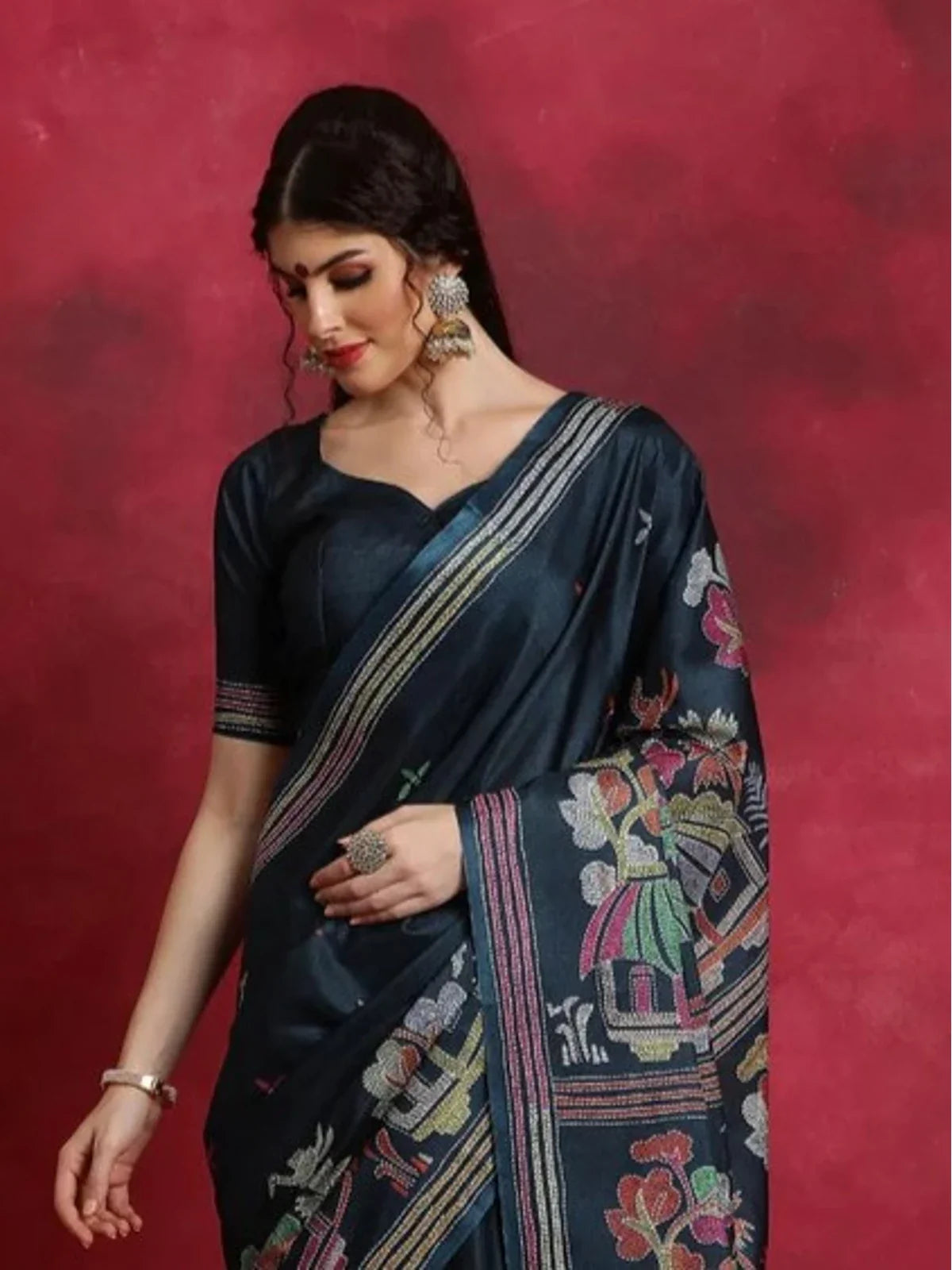 Tarani teal blue Manipuri silk saree upper body view showing blouse and border