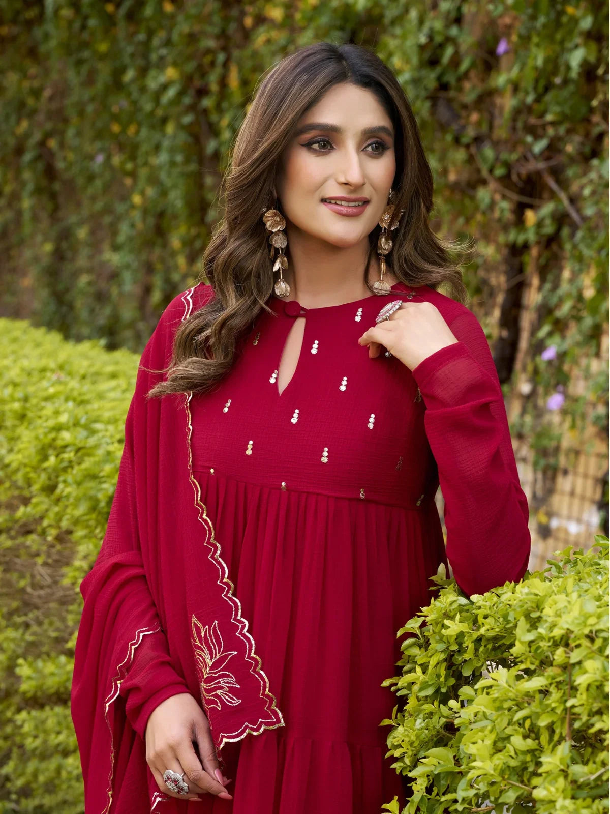 Tarani red dress elegant upper body view with foil work