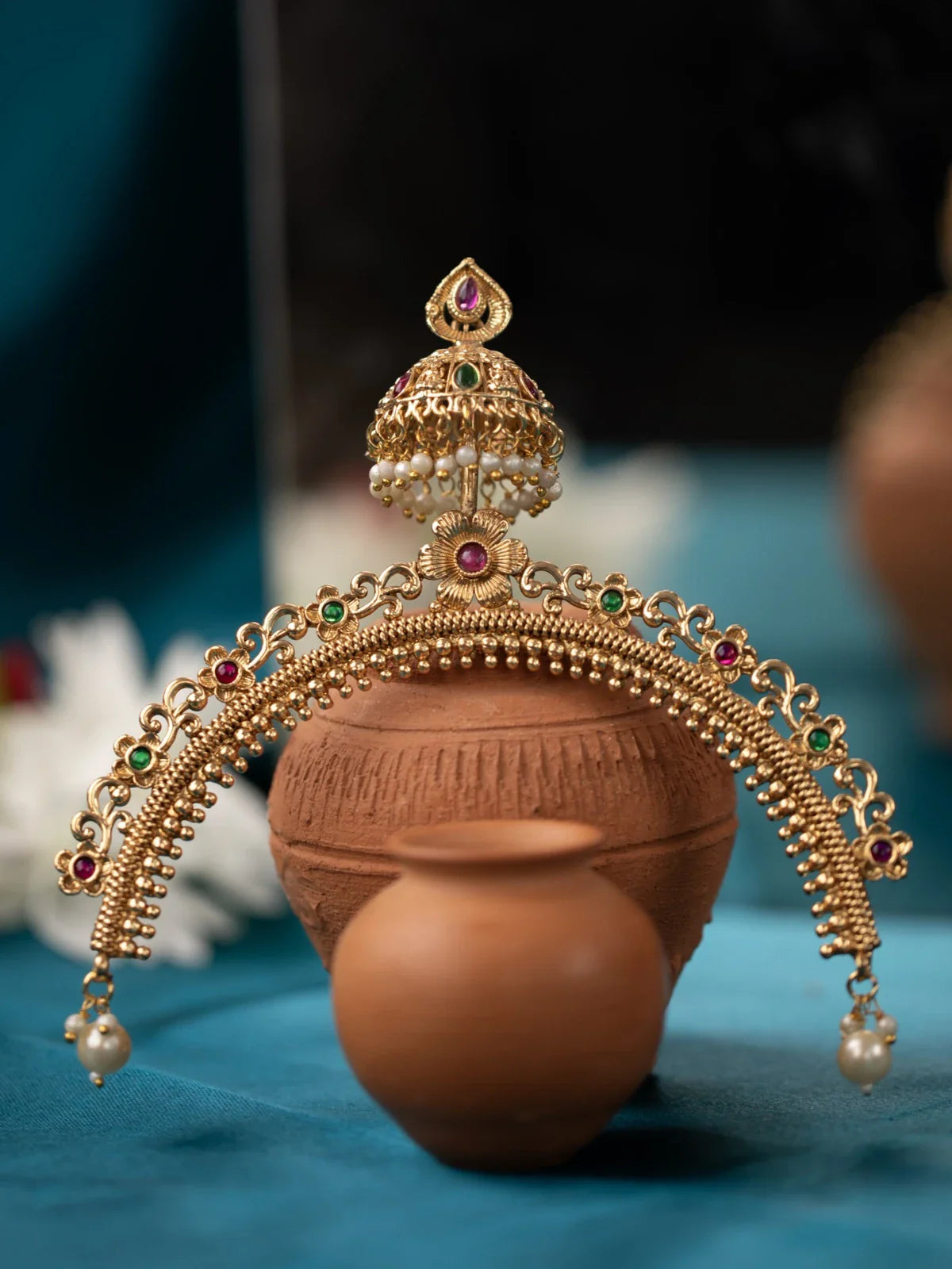 Tarani gold plated mathapatti with pearls and stone studded design for bridal wear