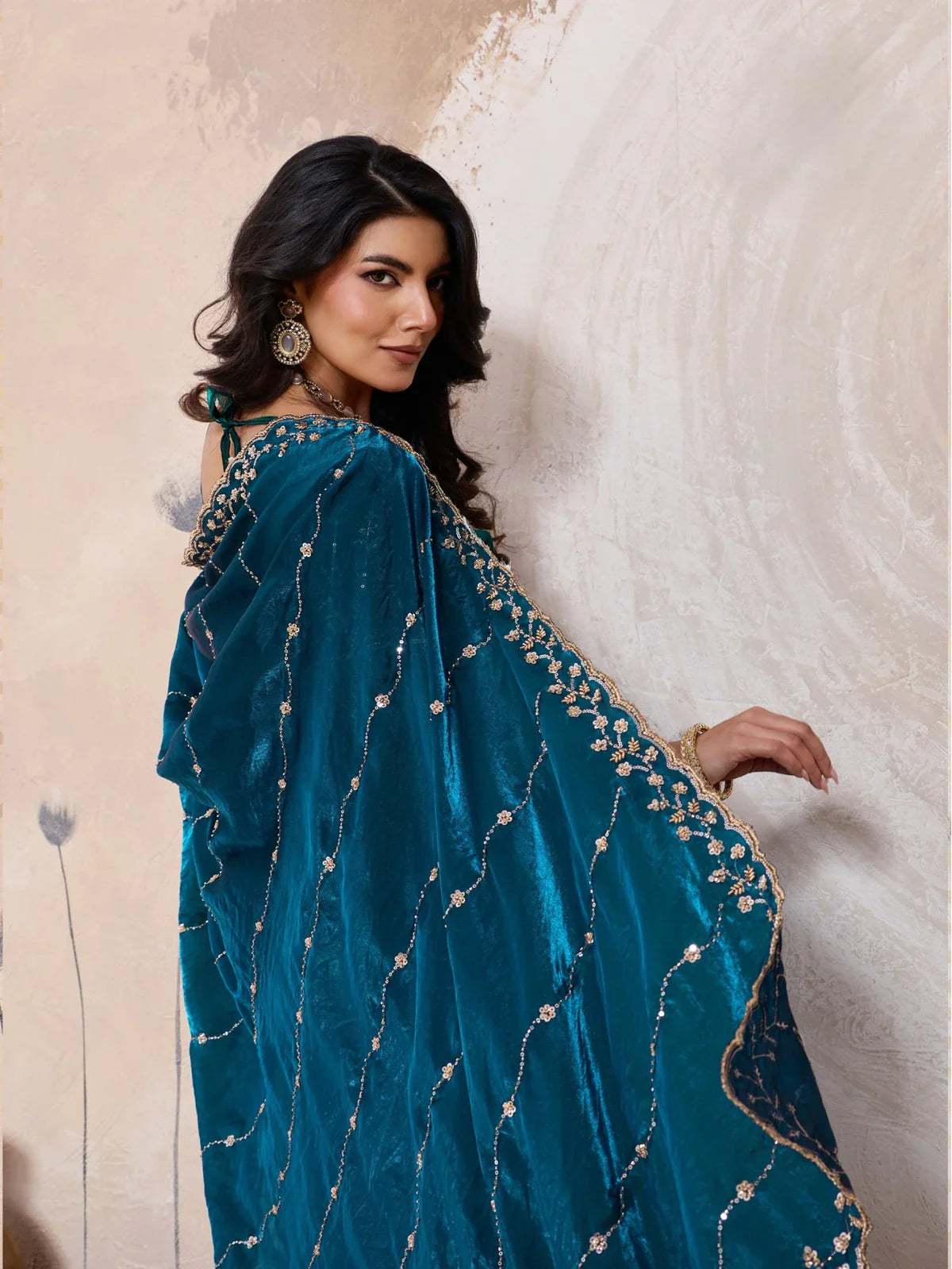 Back side pallu and border embroidery of Tarani metallic velvet satin green saree