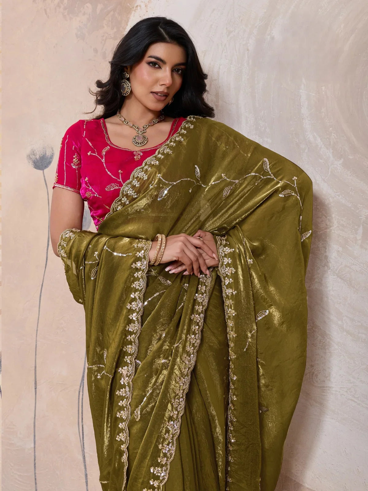 Tarani designer green satin saree upper body view with zari vine embroidery and festive blouse
