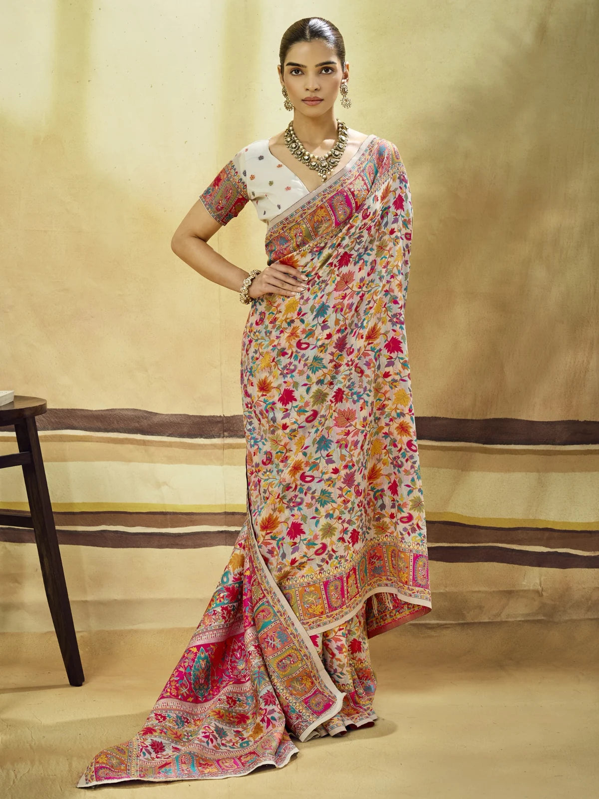 Tarani Harshika beige modal cotton pashmina saree front full view with floral woven design