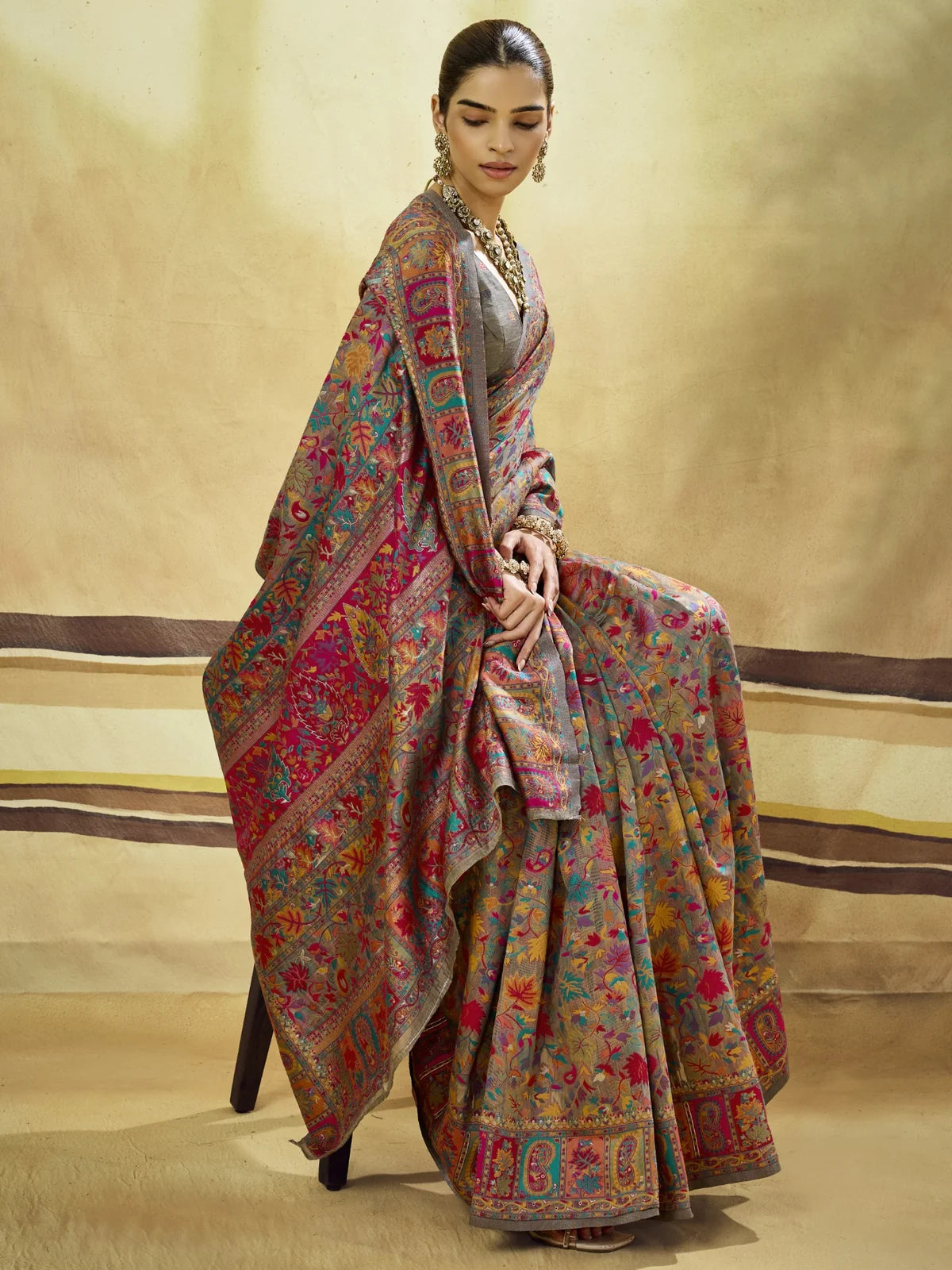 Tarani Ayushiya grey Modal Cotton Pashmina weaving saree side view with floral drape and border