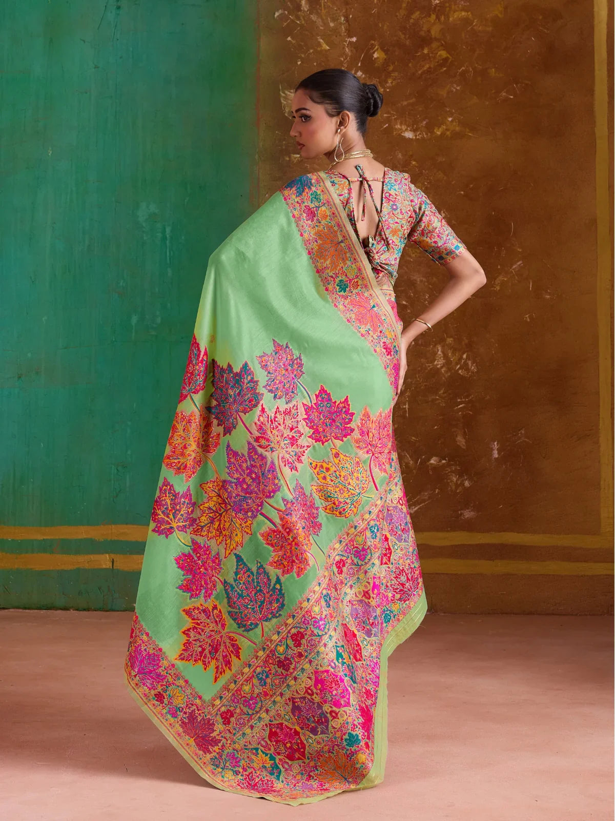 Tarani back view showing multicolor floral pattern and blouse tie-up design