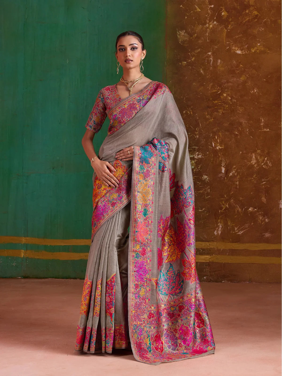 Tarani grey pashmina weaving saree with multicolor border and blouse shown in full front view