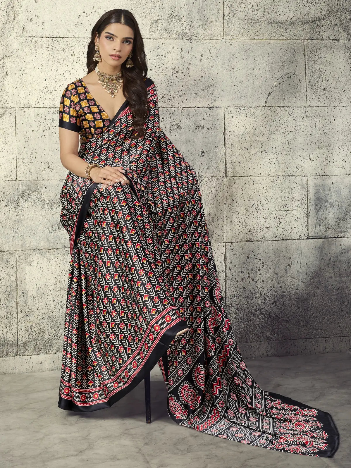 Tarani Nayana black Modal Satin Ajrakh saree front view with elegant floral Ajrakh print and soft drape