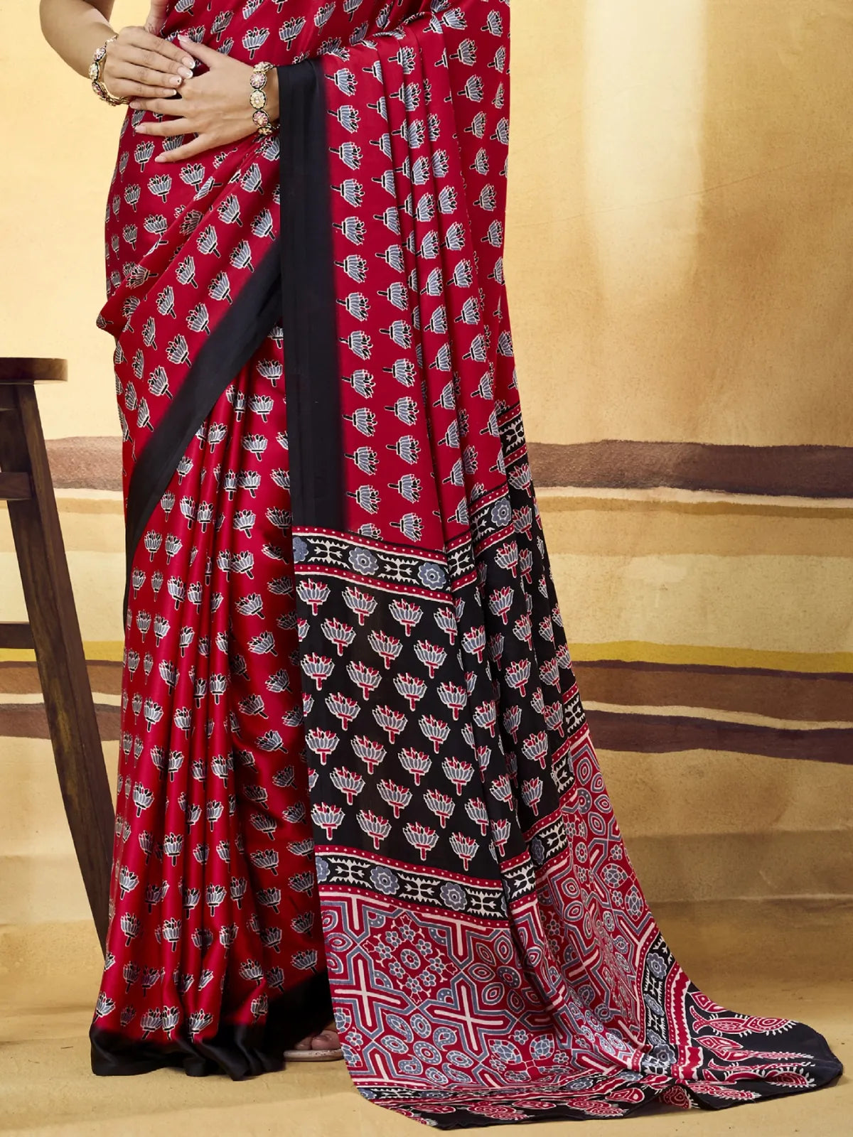 Tarani maroon Modal Satin Ajrakh Print saree pallu close view with printed border