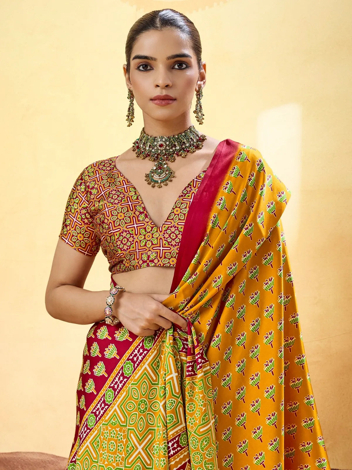 Tarani mustard Modal Satin Ajrakh Print saree upper body view showing blouse