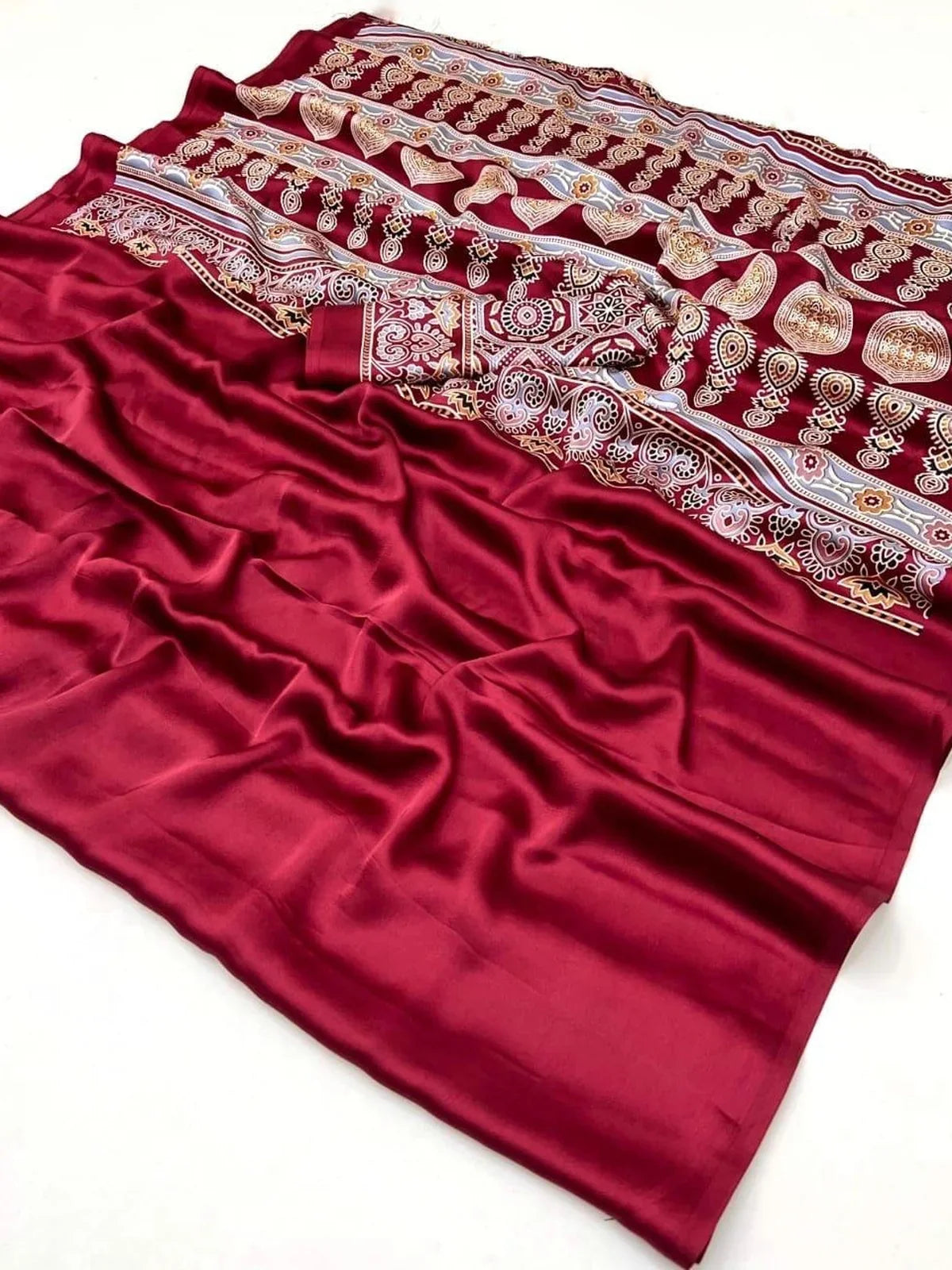 Tarani modal satin Ajrakh saree closeup showing smooth texture and block print details