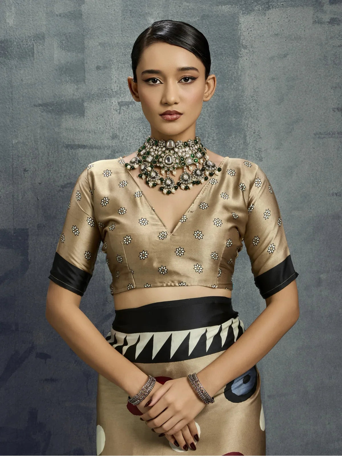 Tarani modal satin saree close-up of blouse with floral pattern and elegant neckline for party wear