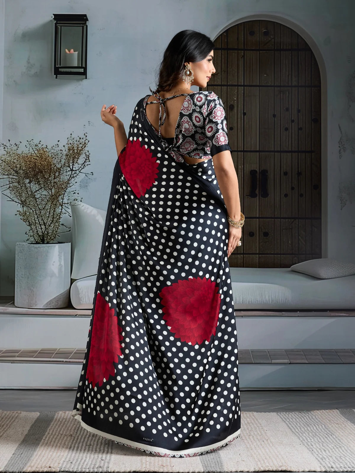 Tarani black modal satin Ajrakh print saree back view with floral pallu and blouse design