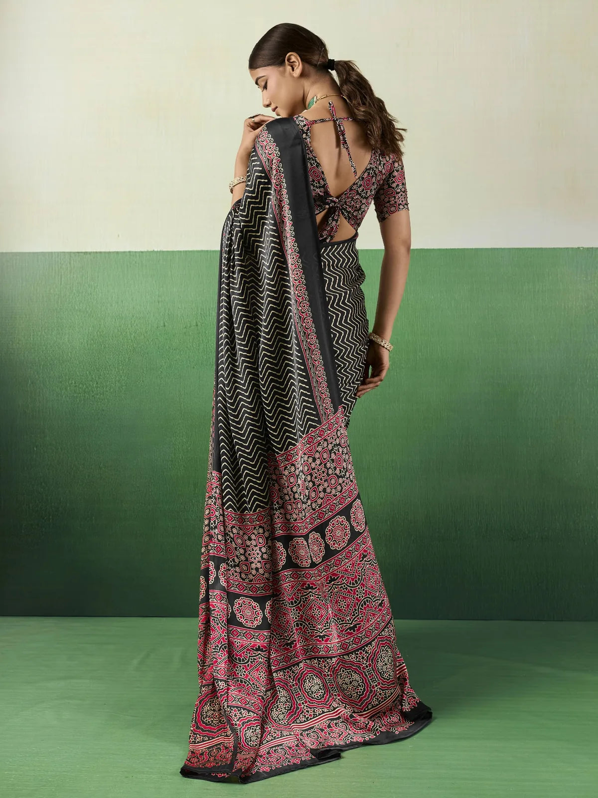 Tarani black Ajrakh print modal satin saree back view with stylish blouse design