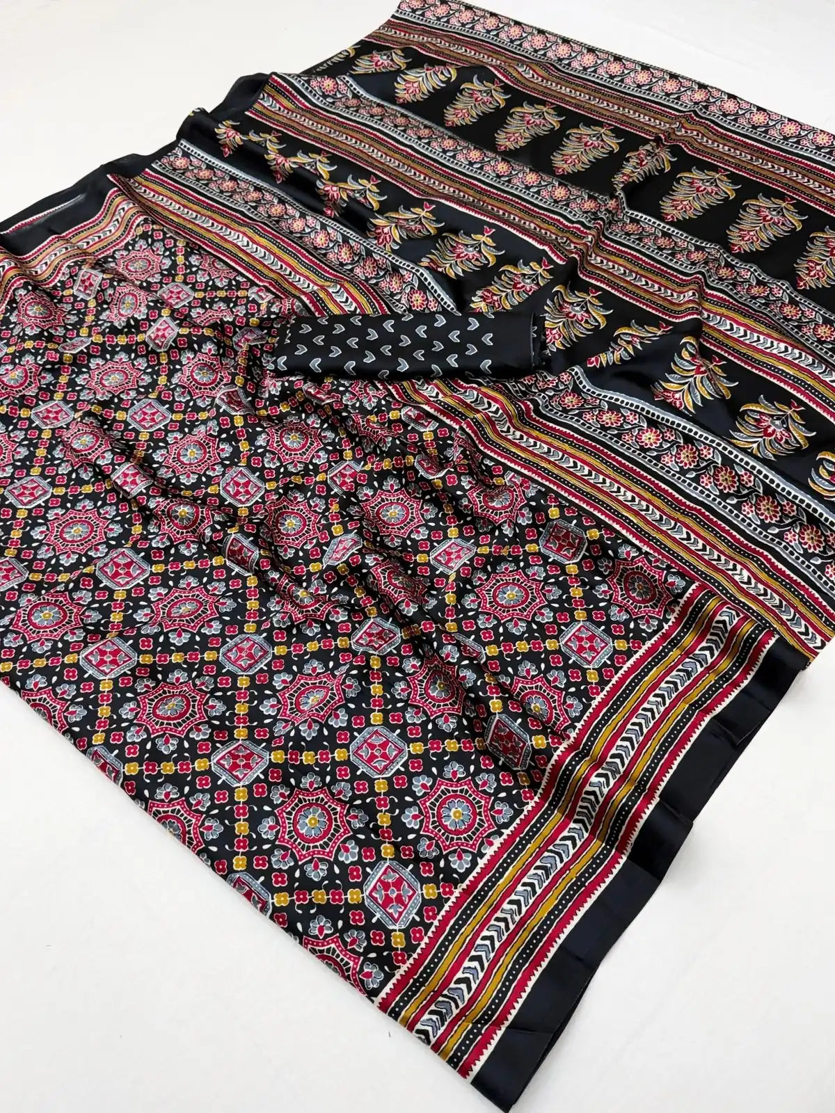 Tarani black Ajrakh print saree with blouse piece laid flat product image