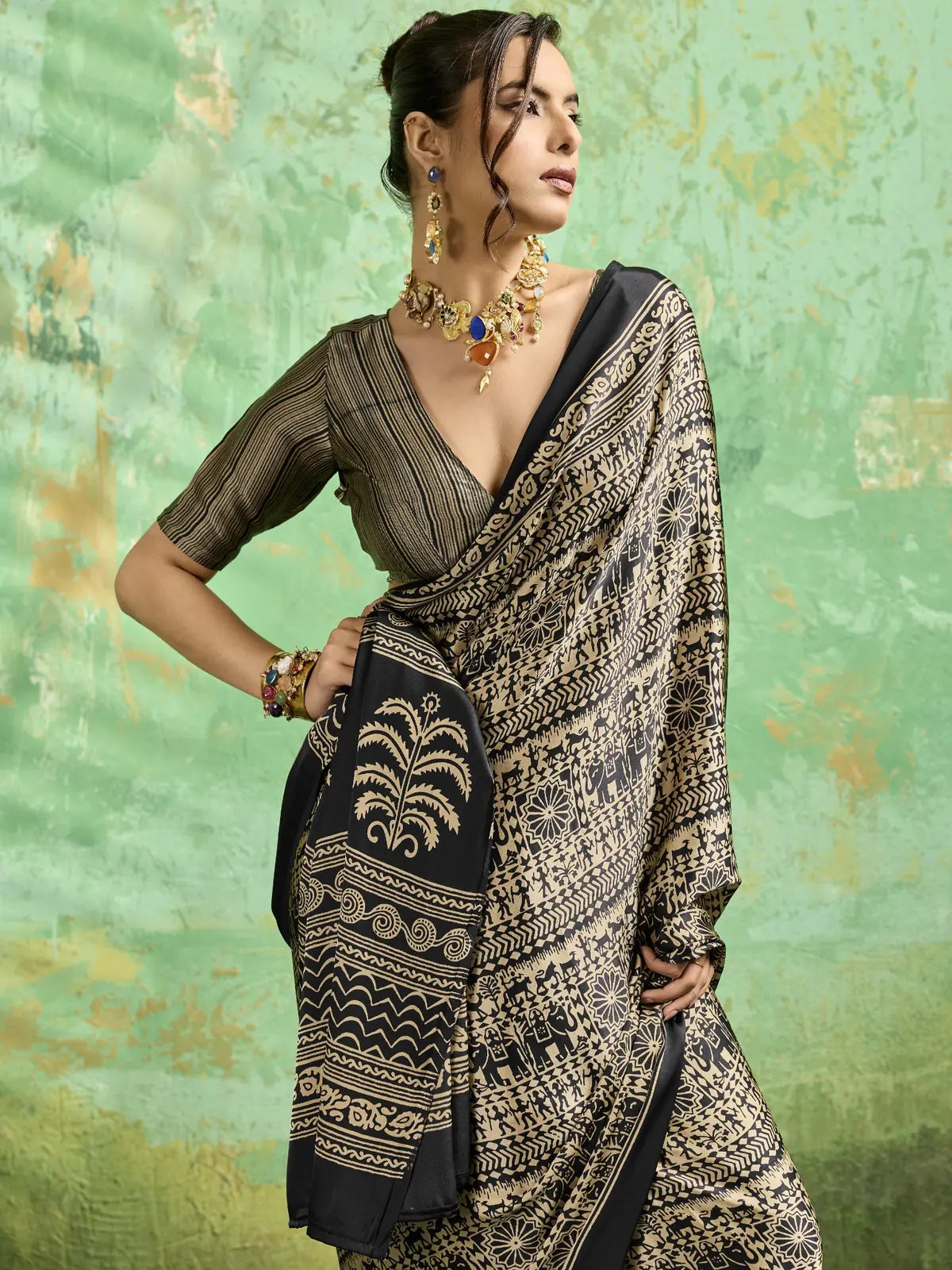 Tarani black Modal Satin Ajrakh Print saree front view with elegant drape