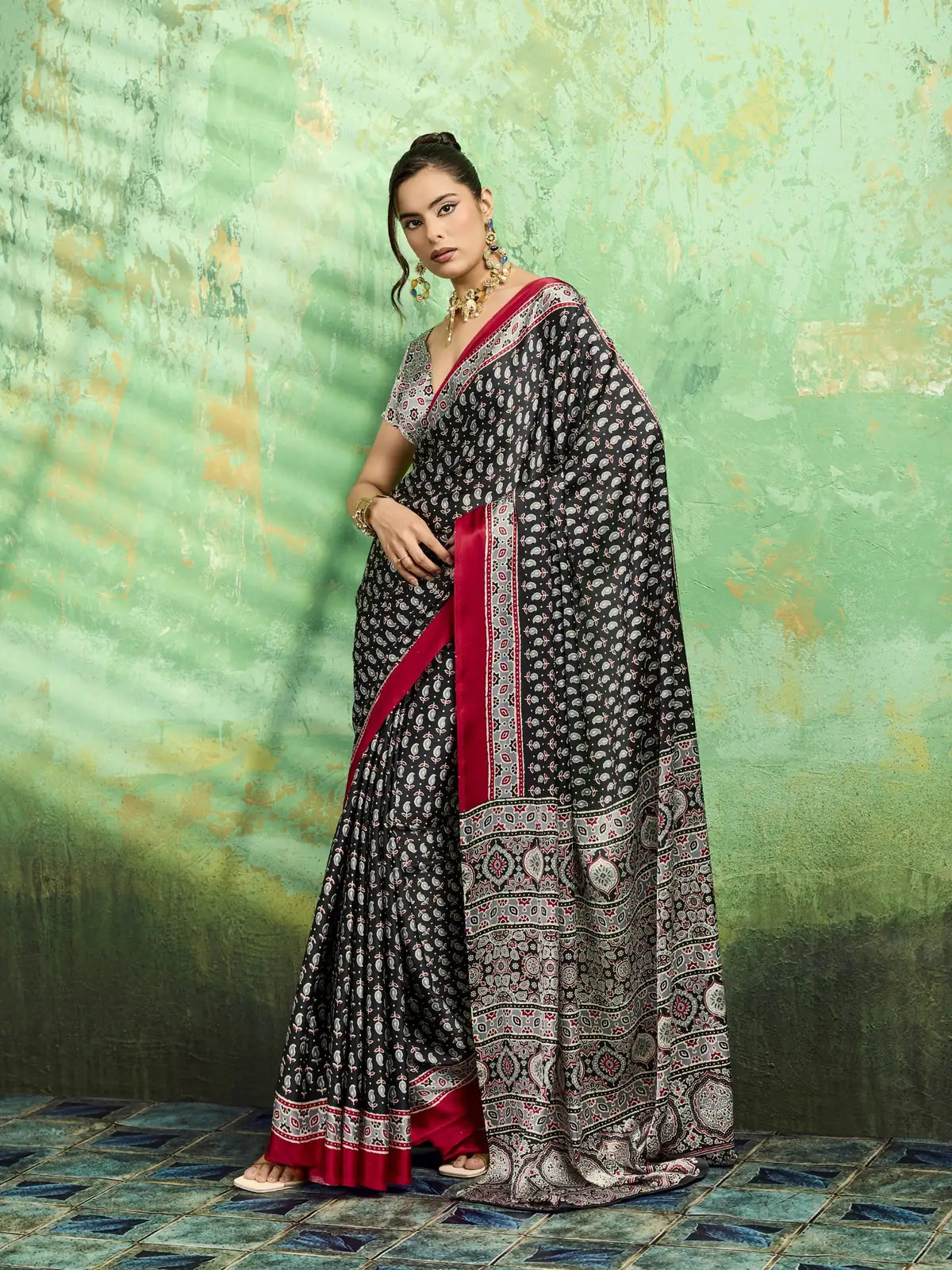 Tarani black modal satin Ajrakh print saree full view with elegant red border and printed blouse