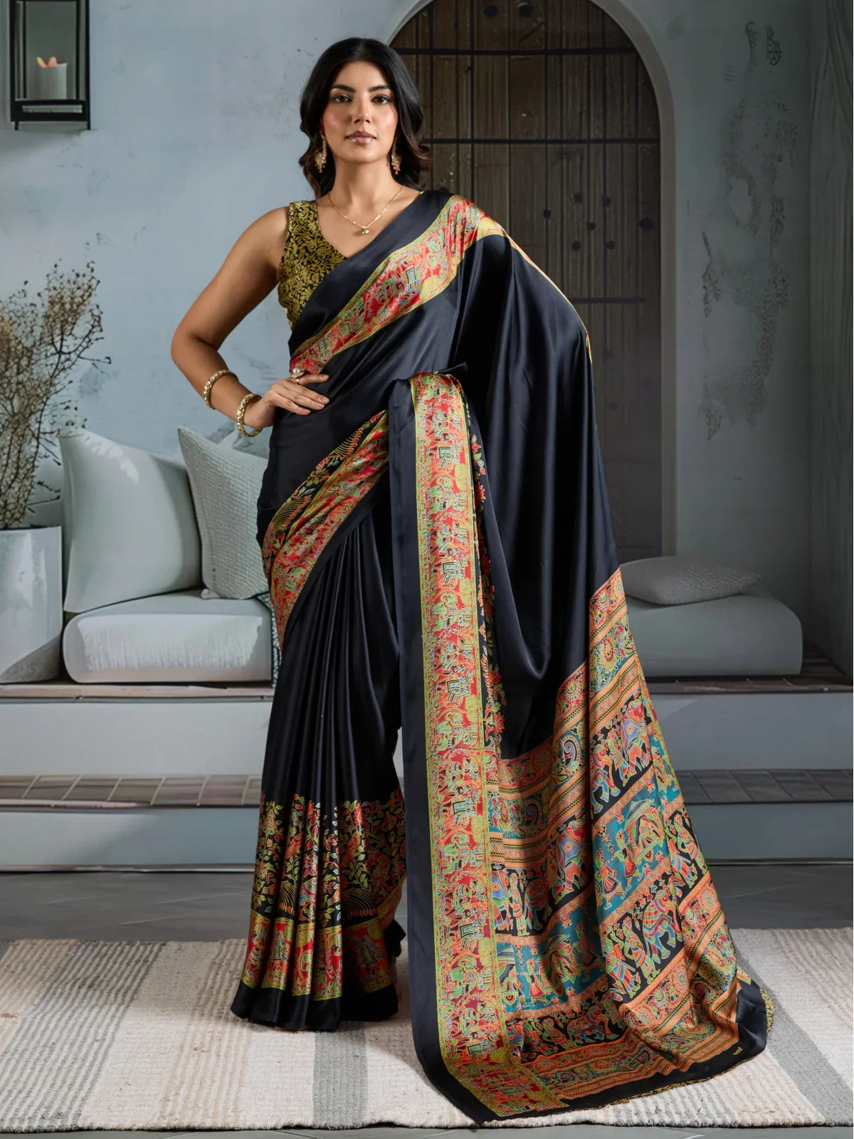 Tarani black modal satin saree full view with vibrant ajrakh print and elegant drape