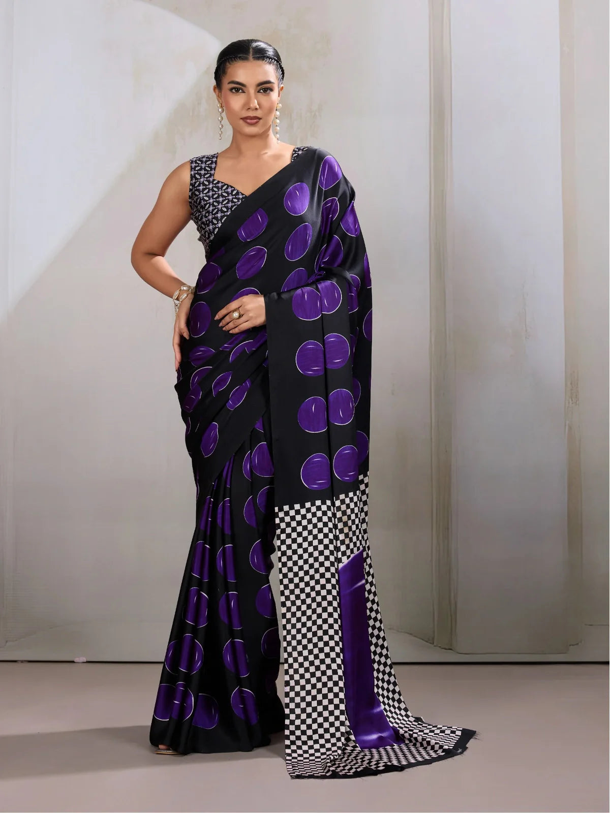 Tarani modal satin black saree with violet round prints and designer blouse for festive party wear