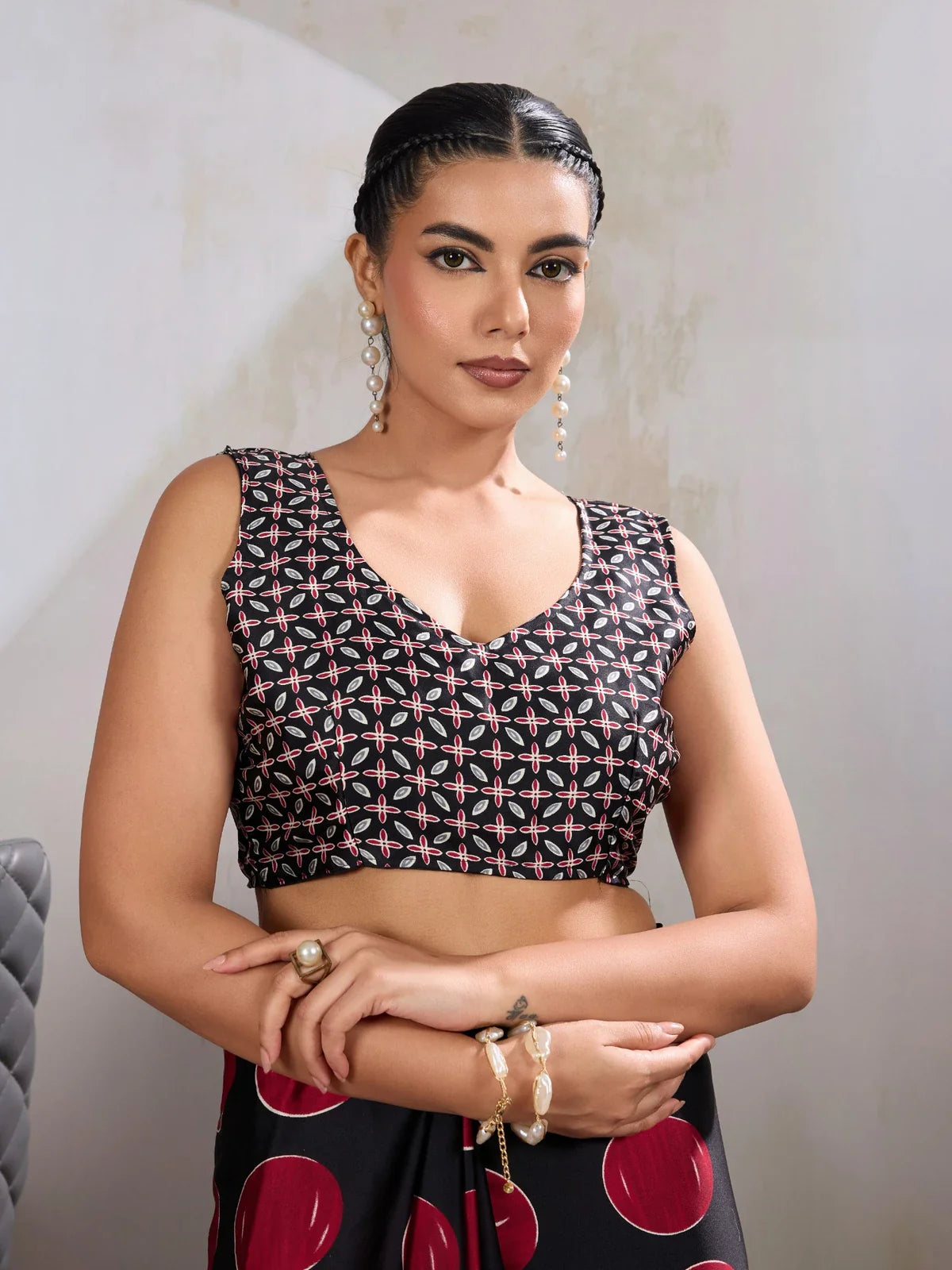 Tarani upper body close-up of modal satin saree with Ajrakh print and matching printed blouse