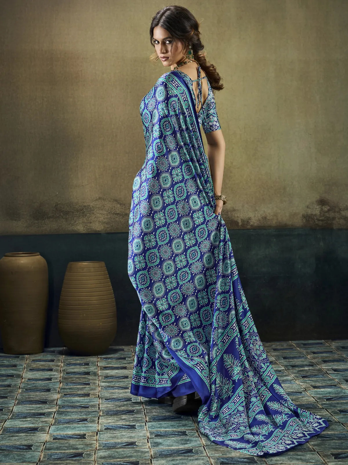 Tarani Swarnima blue Modal Satin Ajrakh print saree back view with matching blouse