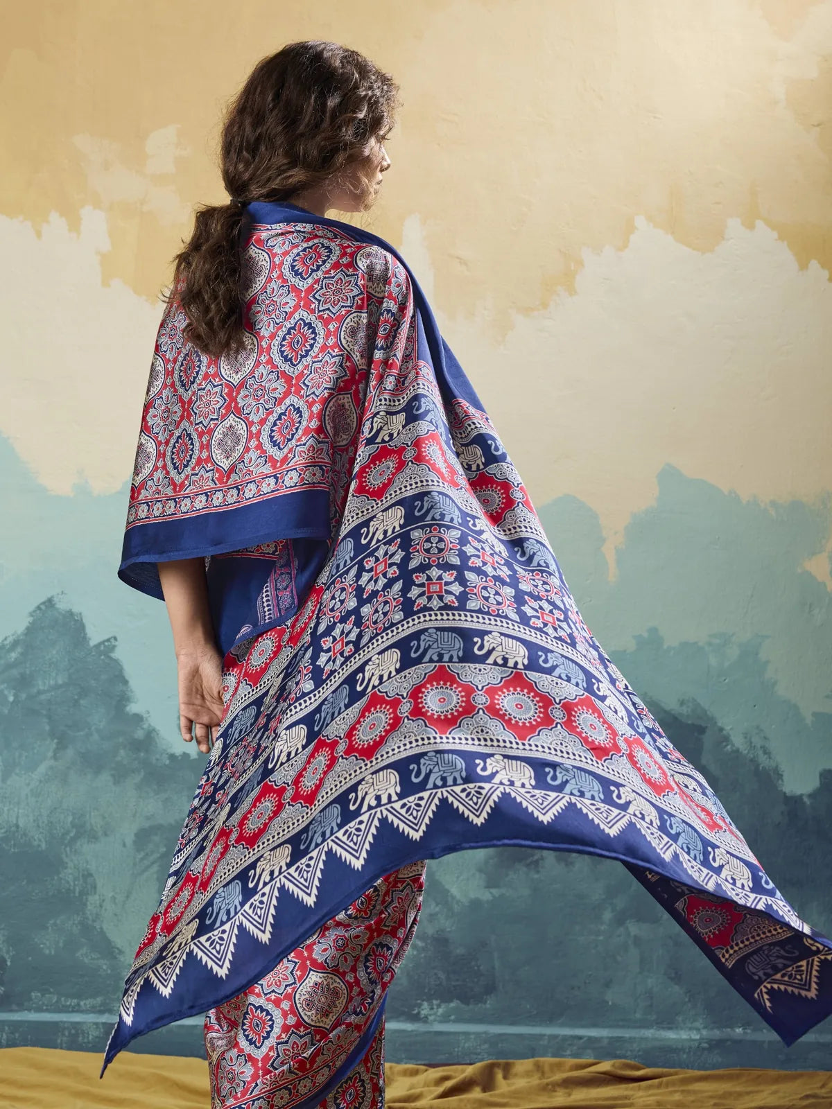 Tarani blue Ajrakh print saree back view with artistic pallu and blouse design