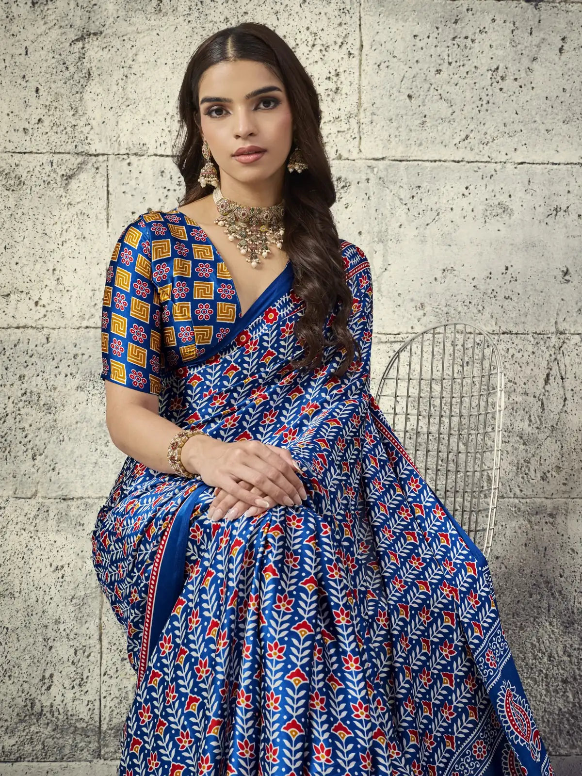 Tarani blue Ajrakh print saree closeup showcasing blouse and floral motifs