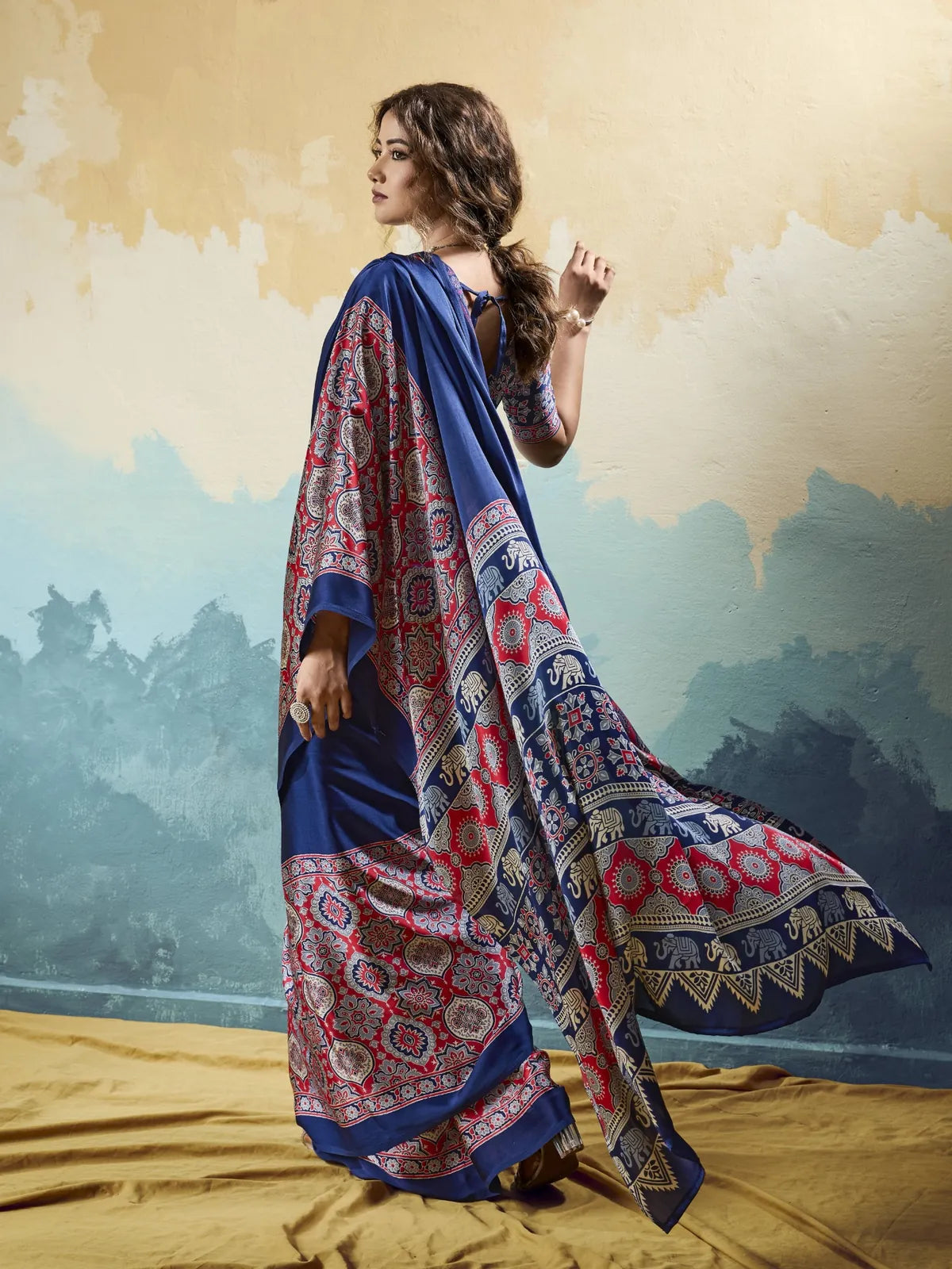 Tarani blue Ajrakh print saree pallu view with elegant border and flowing drape