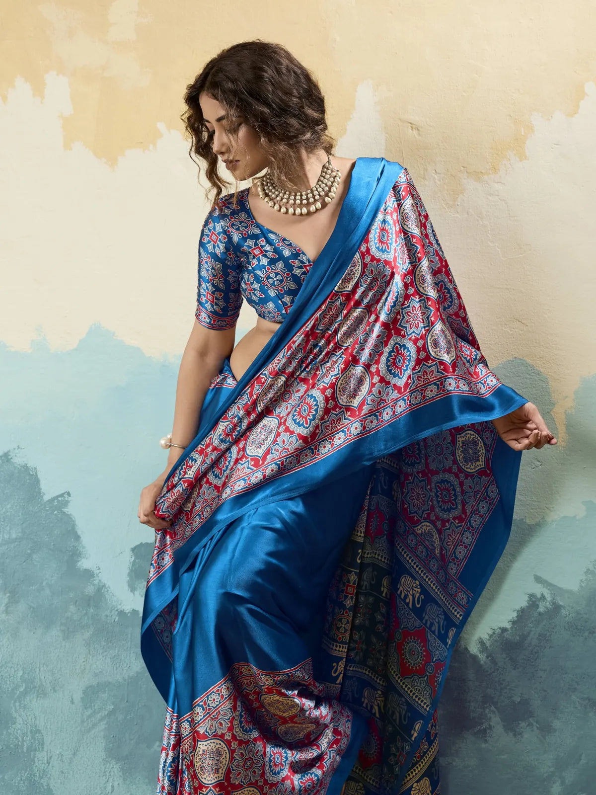 Tarani blue modal satin Ajrakh print saree pallu view with intricate ethnic border detailing