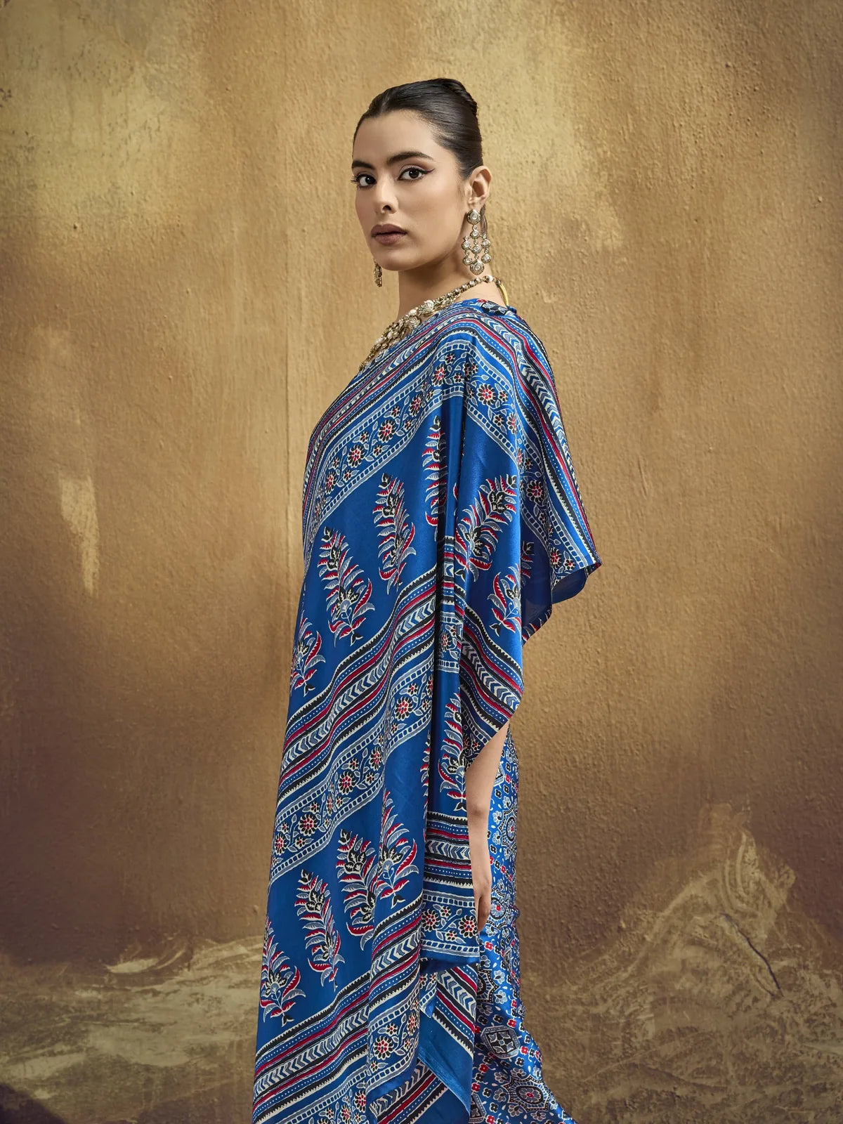 Tarani blue Ajrakh print saree side profile showcasing rich pallu and ethnic print detailing