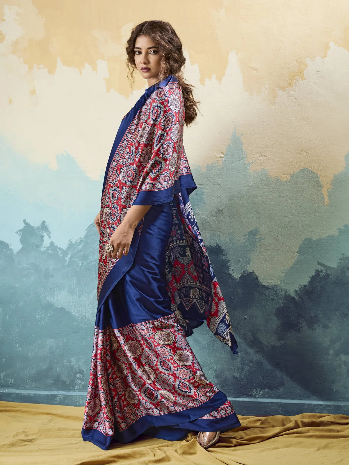 Tarani blue modal satin saree side view with graceful Ajrakh printed pallu styling