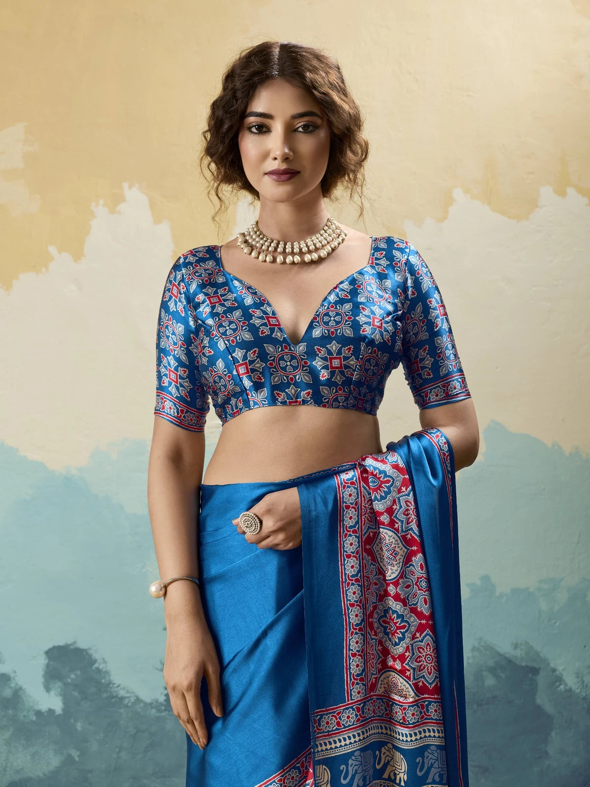 Tarani blue modal satin Ajrakh print saree upper body view with matching printed blouse