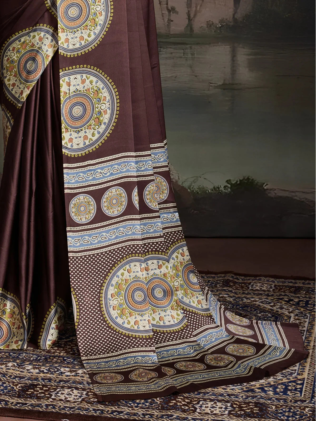 Tarani brown saree pallu with geometric mandala ajrakh motifs and fine border detailing