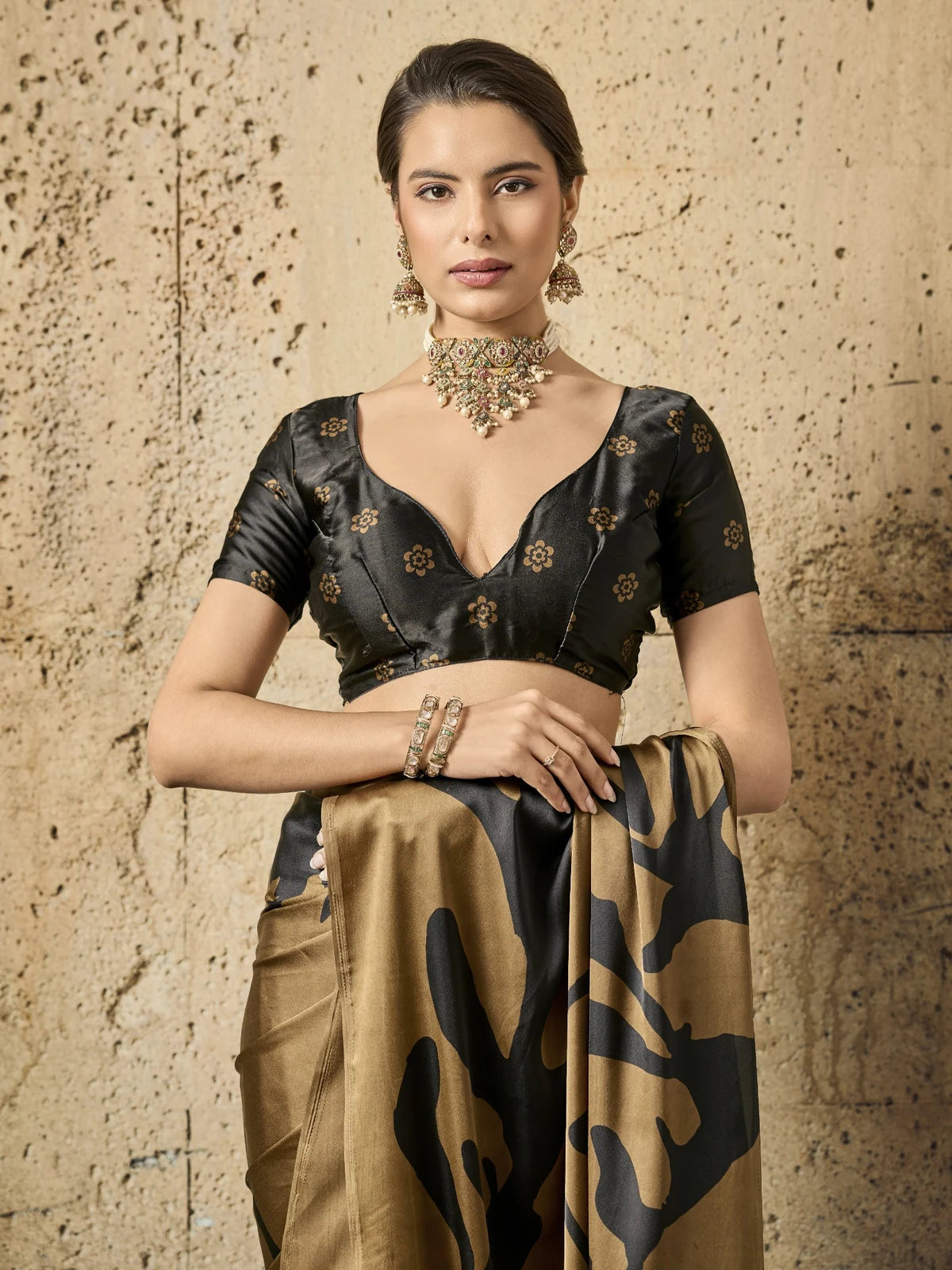 Tarani brown modal satin Ajrakh print saree upper body look with elegant printed blouse and jewelry styling