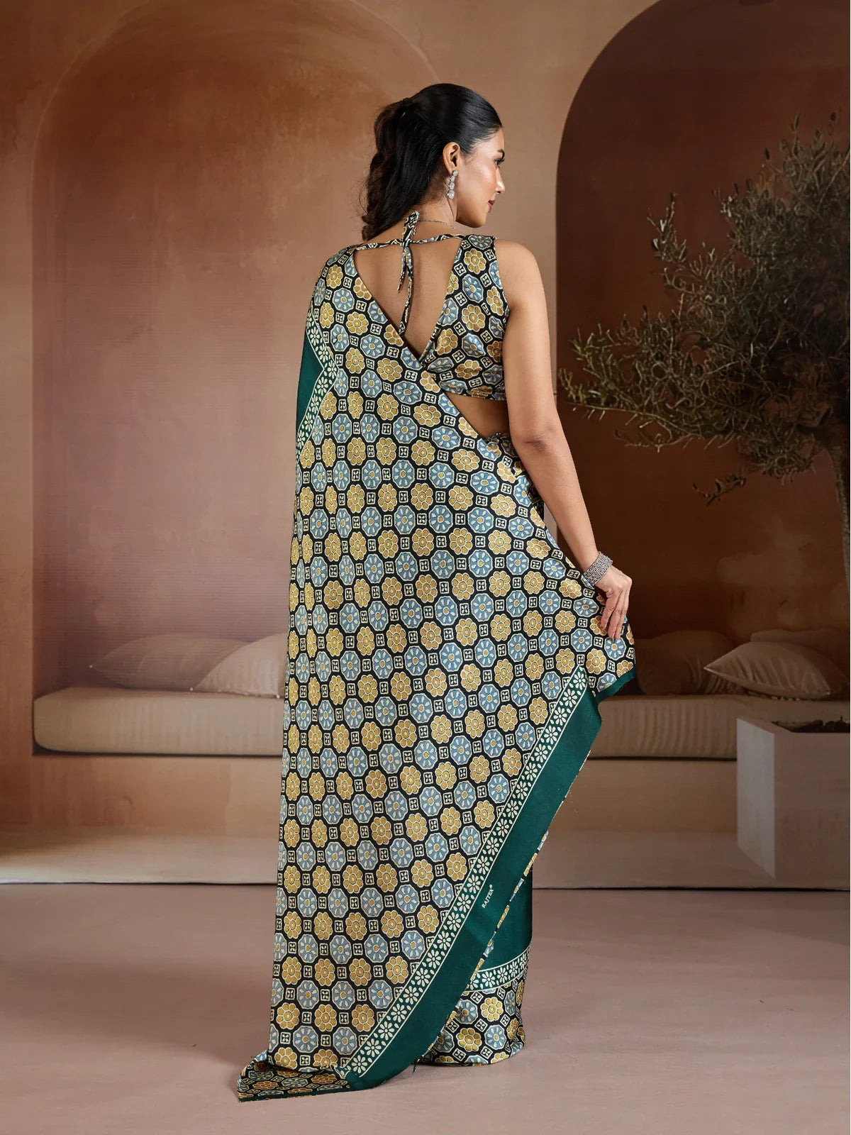 Tarani full back view showing blouse back tie-up style and overall Ajrakh pattern