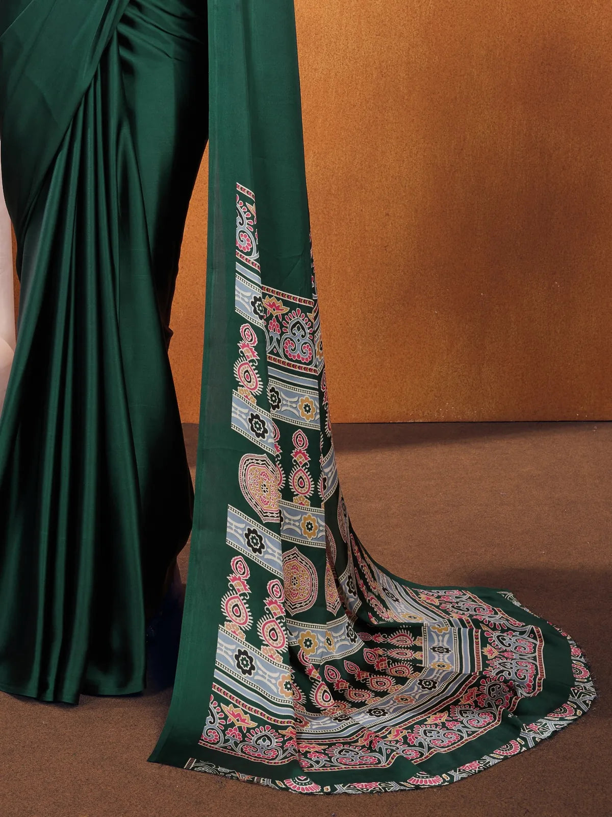 Tarani saree with detailed pallu view in Ajrakh print on green satin fabric