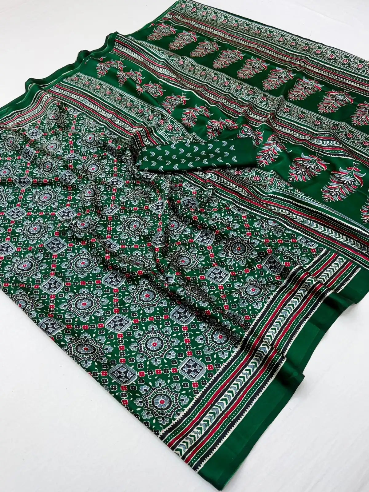 Tarani green modal satin Ajrakh print saree zoom view highlighting rich Ajrakh print texture