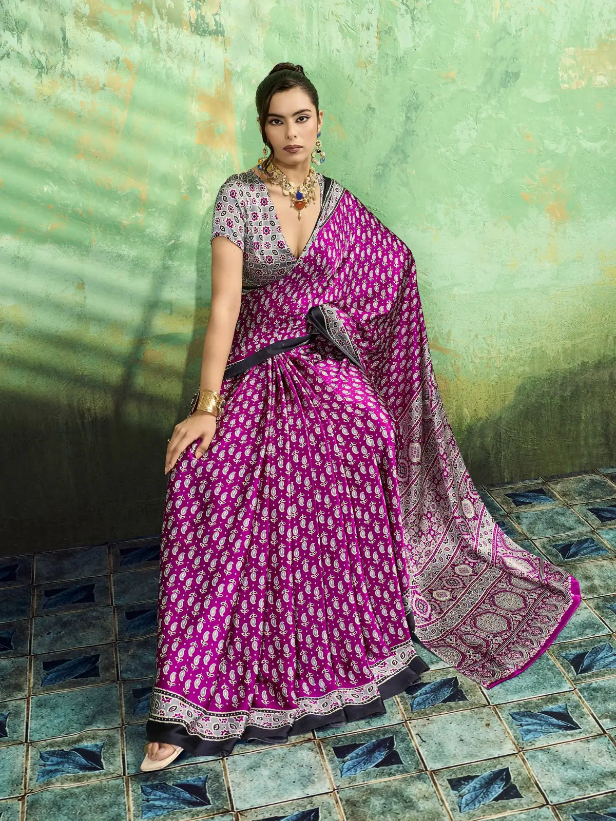 Tarani magenta modal satin saree front pose with soft drape and Ajrakh print styling