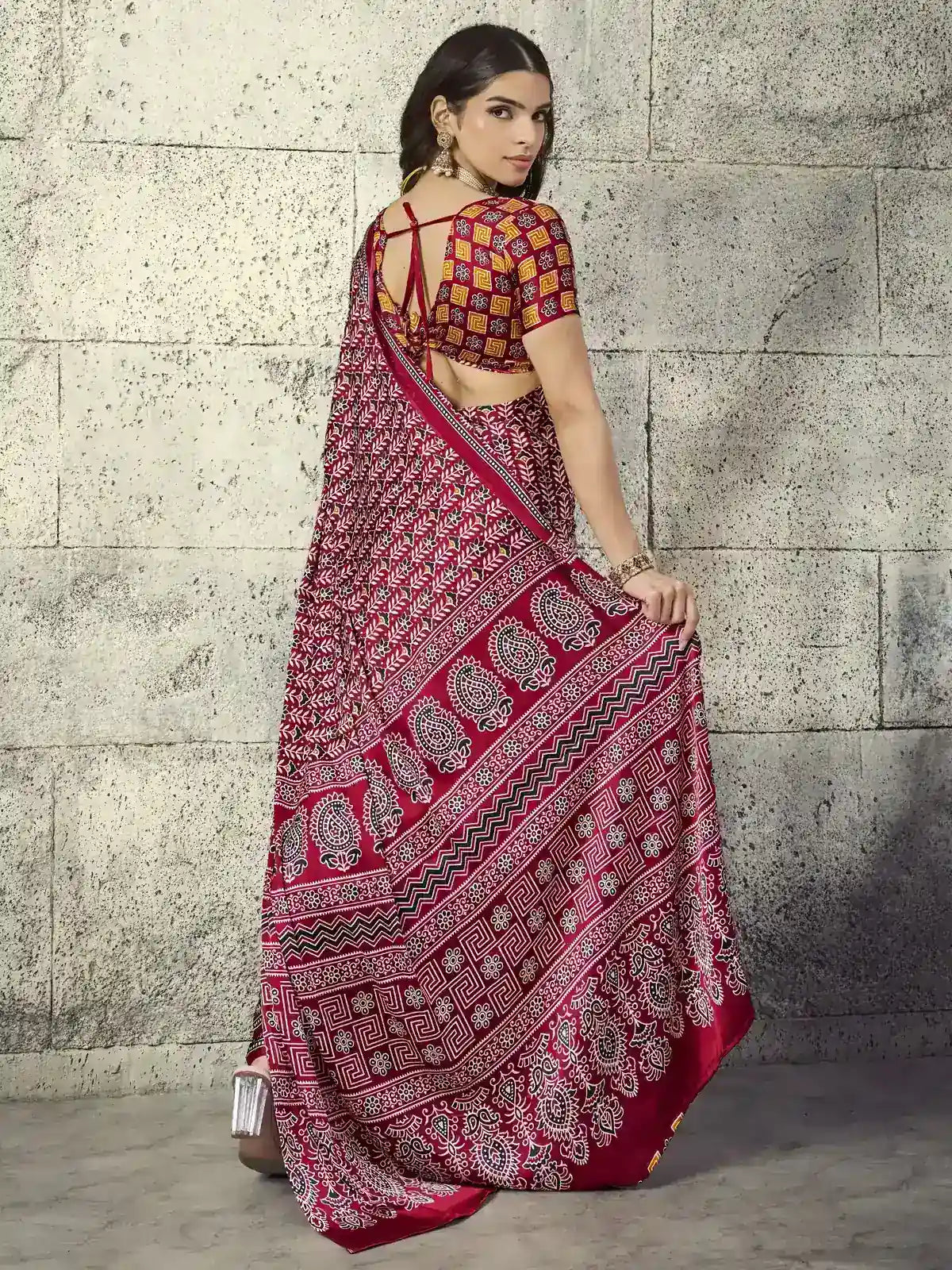 Tarani maroon Modal Satin Ajrakh Saree back view with blouse back design and flowing pallu