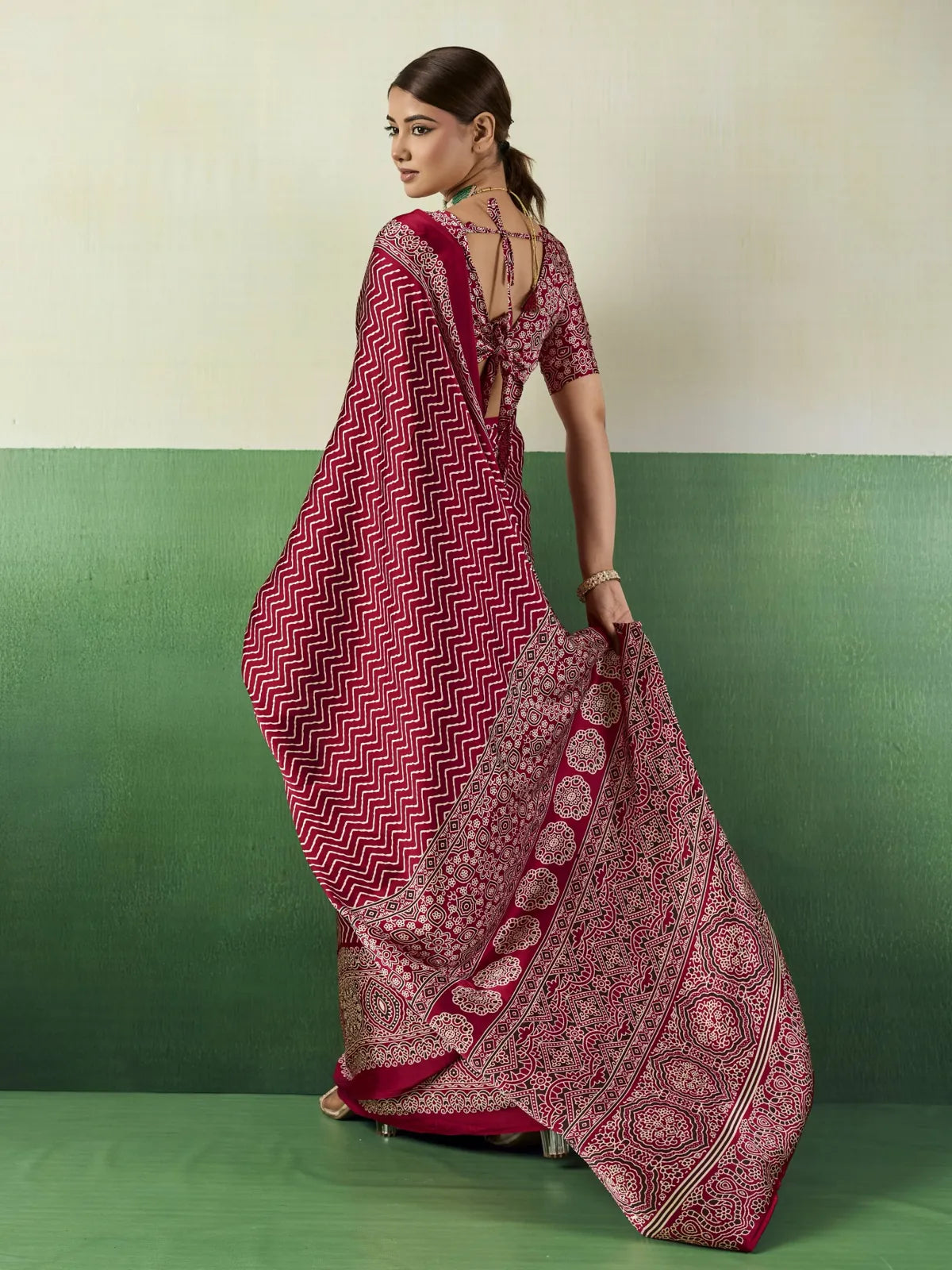 Tarani maroon modal satin Ajrakh print saree back view showcasing blouse back design and pallu