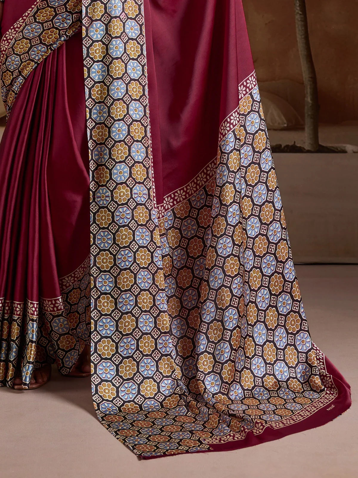 Tarani modal satin saree with focus on printed pallu and detailed border design