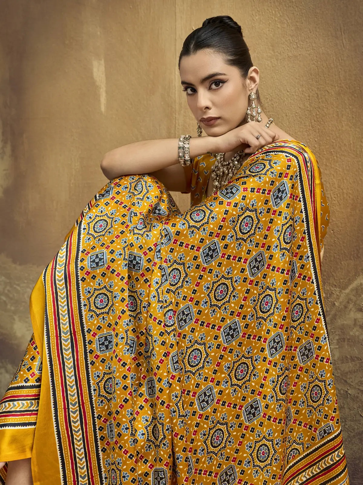 Tarani mustard modal satin Ajrakh saree closeup detailing and border design