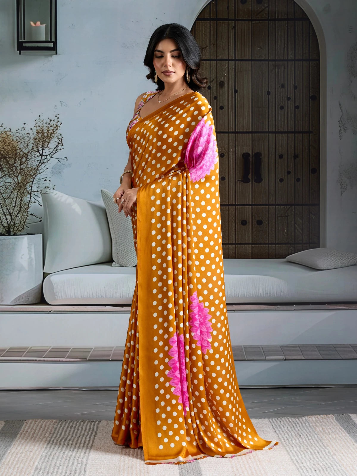 Tarani mustard modal satin saree side pose with floral pallu detailing
