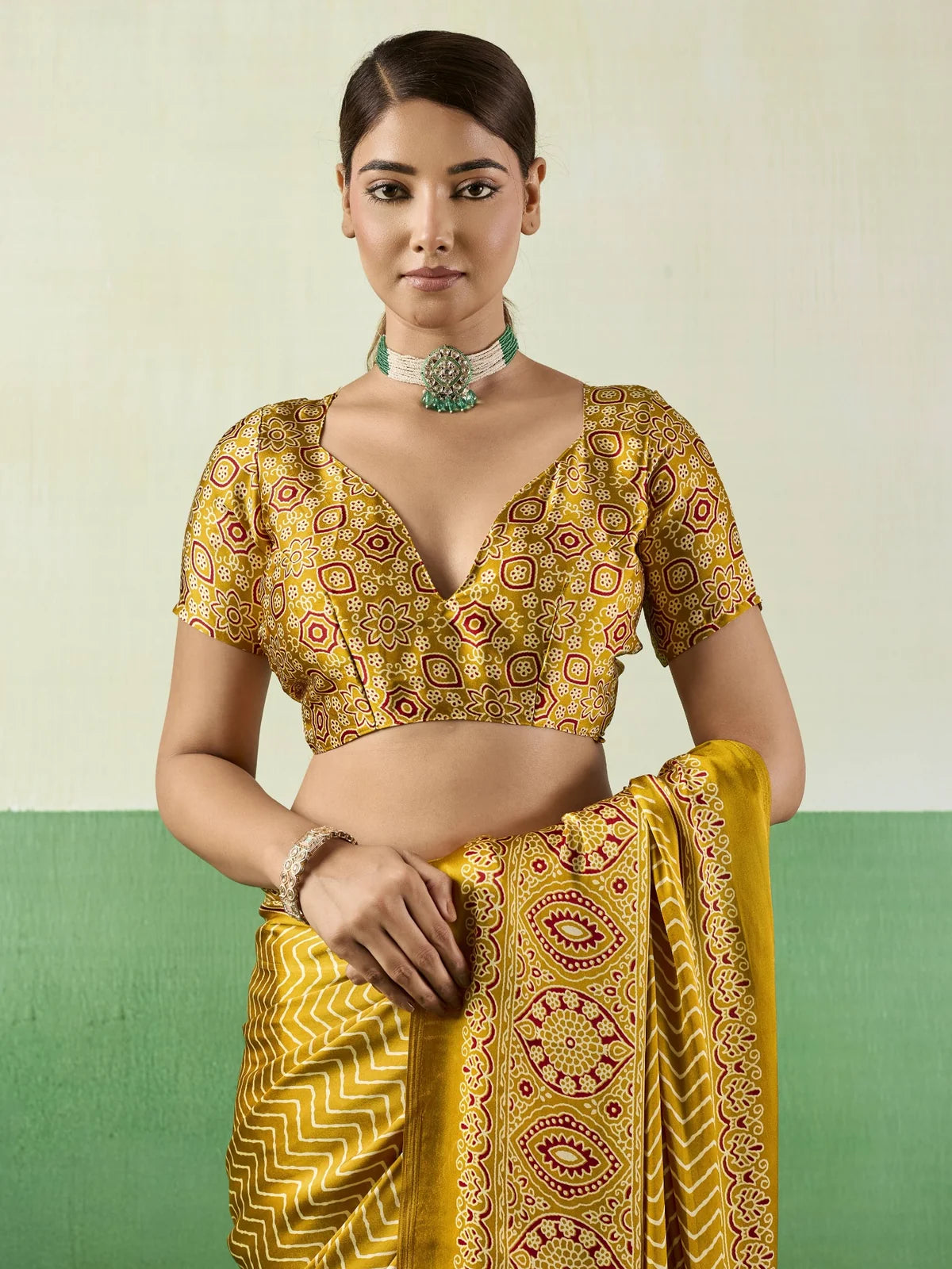 Tarani mustard Ajrakh print modal satin saree upper body look with stylish printed blouse