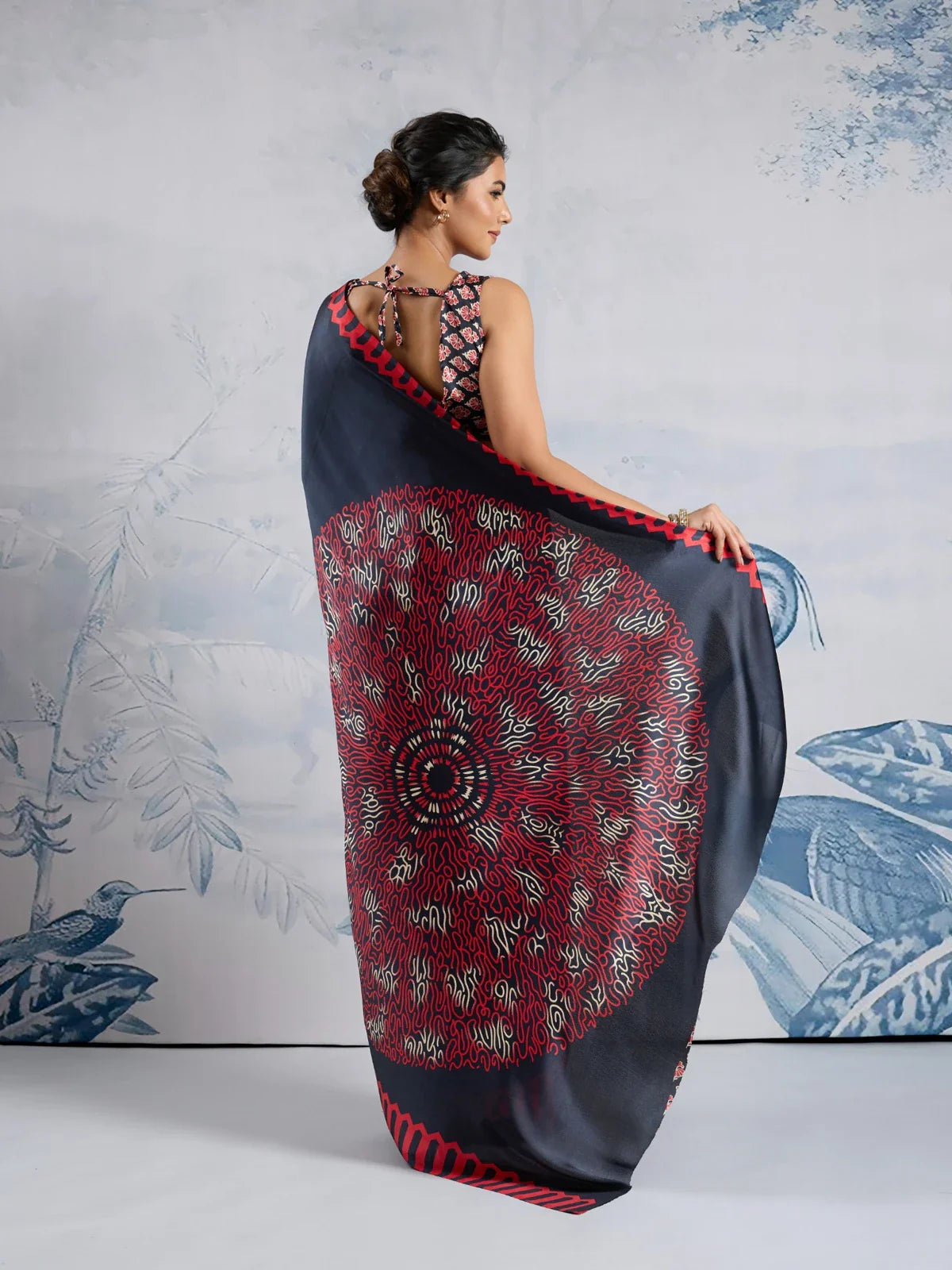 Tarani modal satin saree back view with circular Ajrakh print and halter style blouse