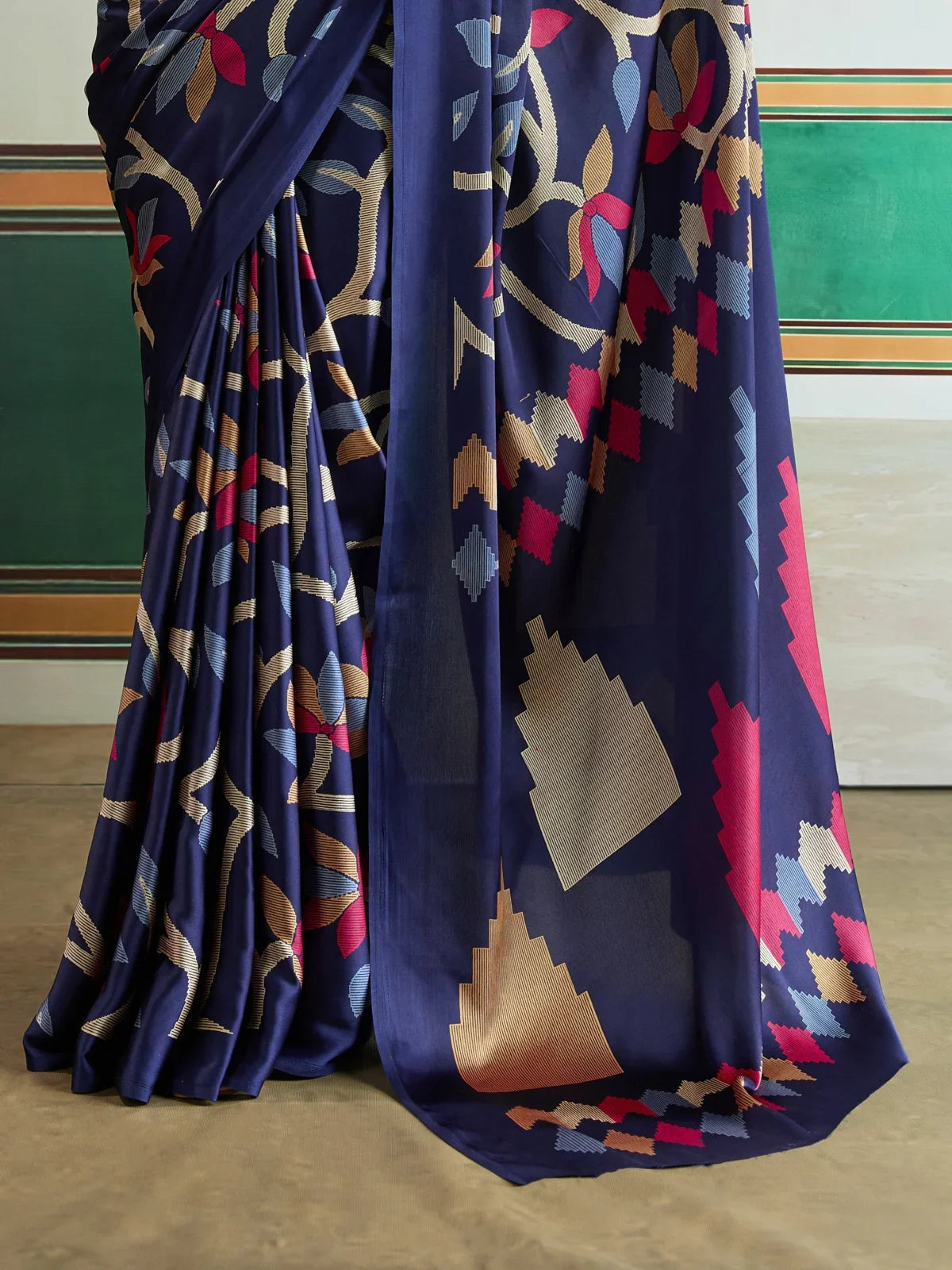Tarani modal satin saree close-up showing multicolor print and intricate drape in navy tone