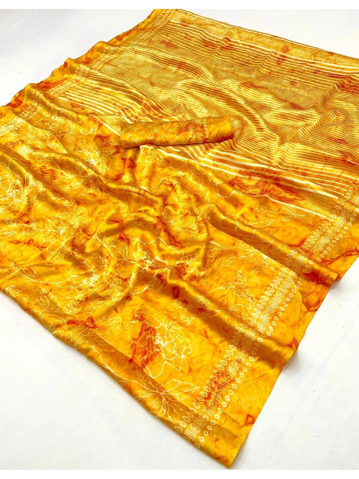 Tarani modal satin fabric with ajrakh and floral print texture in bright orange tone