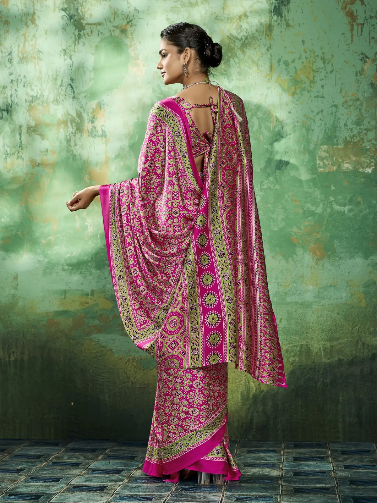 Tarani pink modal satin Ajrakh print saree back view showing stylish blouse pattern and pallu fall