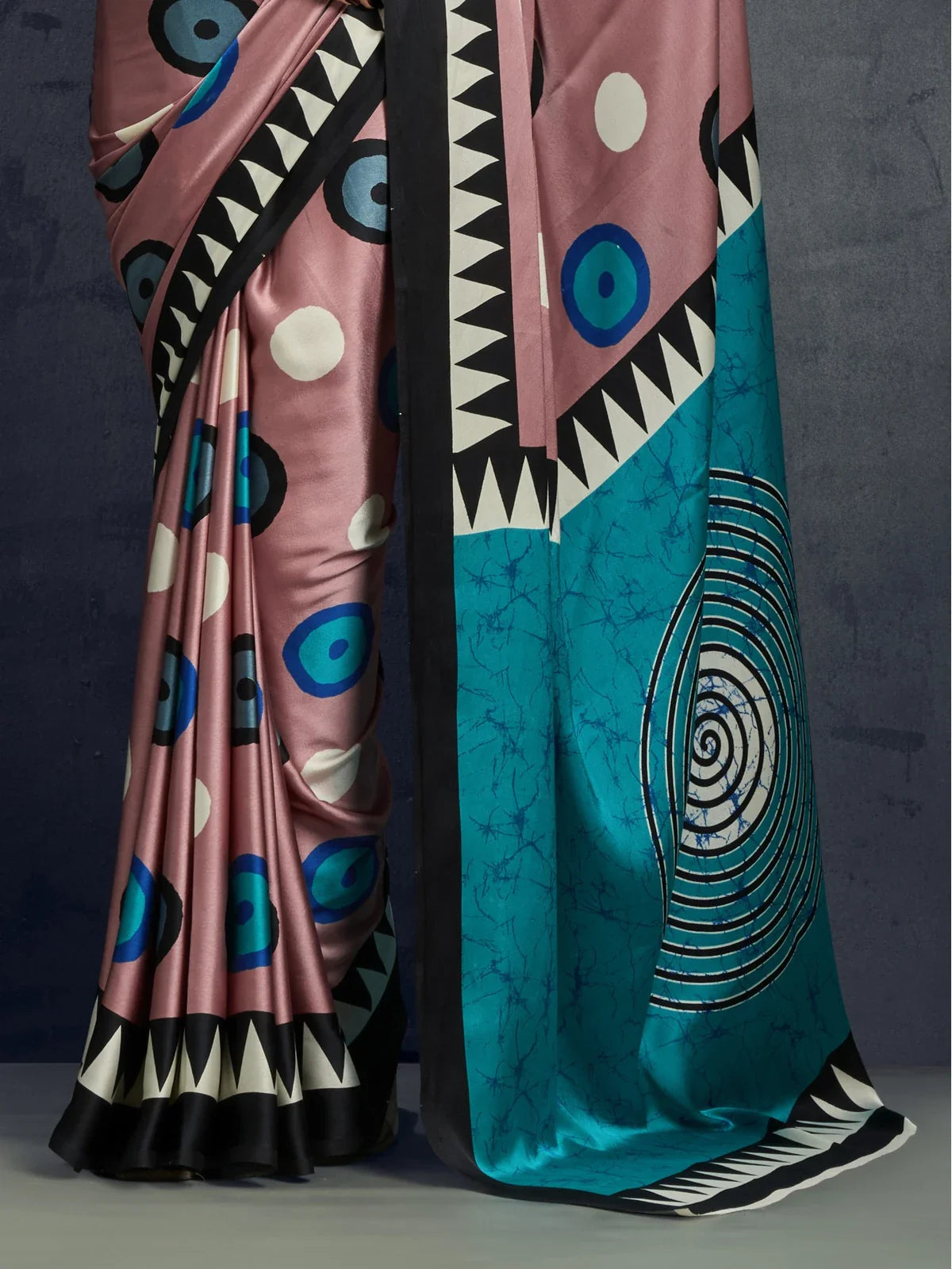 Tarani modal satin saree closeup showing detailed circular ajrakh print and textured fabric finish