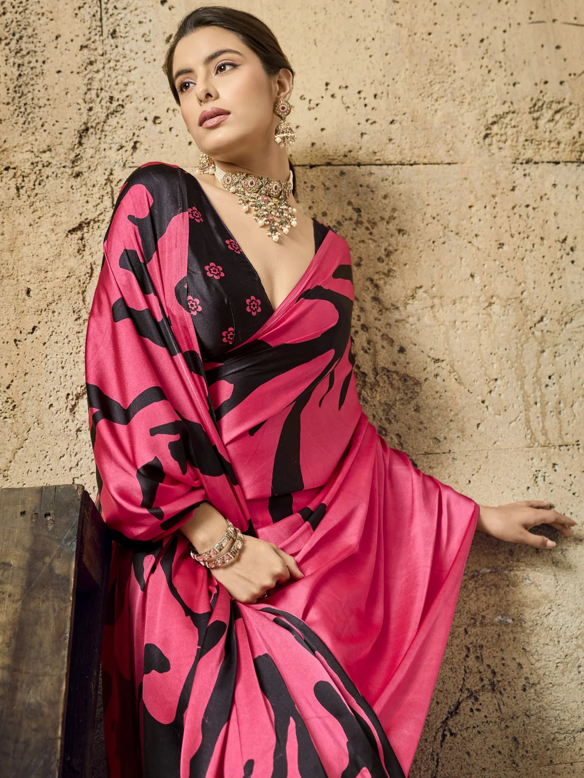 Tarani pink ajrakh print modal satin saree pallu view with flowing designer drape