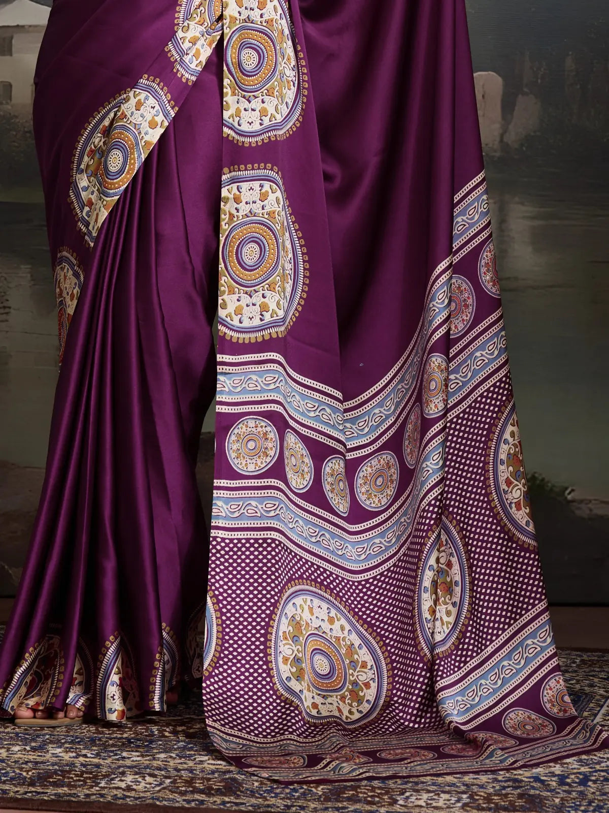 Close-up of Tarani Ajrakh Modal Satin saree fabric design with traditional motifs