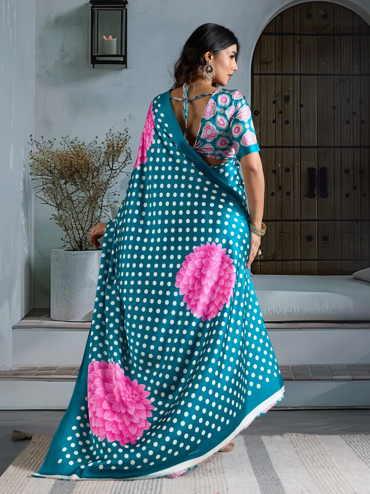 Tarani teal modal satin Ajrakh print saree back view with floral pallu